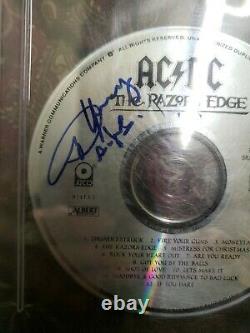 Ac/dc Angus young Signed Cd Slabbed RARE! PSA/DNA With INSCRIPTION