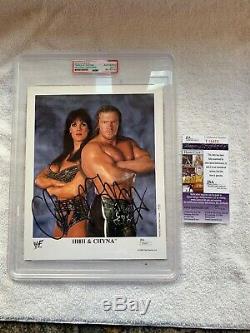 TRIPLE H & CHYNA Signed Promo 8x10 SLABBED withDual (PSA DNA & JSA) AUTHENTICATION